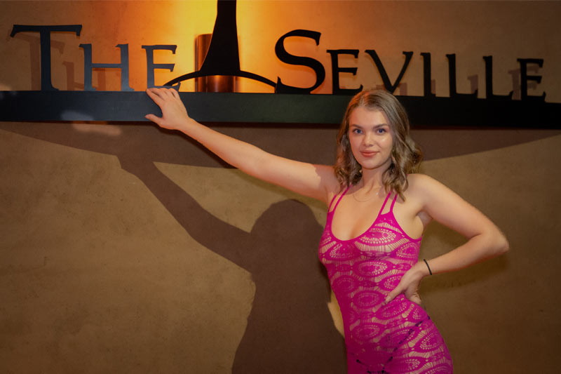 The Seville Signage and girl
